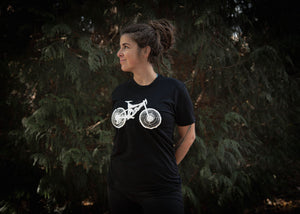 Women wearing a black T-shirt with a white mountain bike design