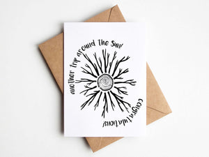 Another Trip Around the Sun, Greeting Card featuring black and white illustration inspired by PNW on 100% recycled paper.