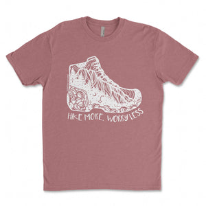 Hike More, Worry Less; Unisex T-shirt, Responsibly Made featuring outdoor illustrations on a pink shirt.