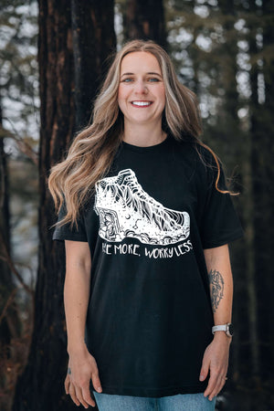 Hike More, Worry Less; Unisex T-shirt, Responsibly Made, worn outdoors, showcasing original artwork by Canadian artist.
