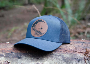 Moon and Climber Trucker Hat durable outdoor hat for women designed in Canada by a Canadian artist.
