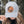 Moon and Climber Trucker Hat worn by a woman outdoors, featuring a faux leather patch and adjustable snapback.