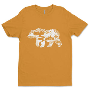 Roaming Bear, Unisex T-shirt, Responsibly Made featuring outdoor illustrations on a mustard yellow fabric.