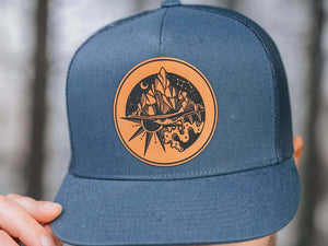 Sea to Sky, Flat Bill Hat with faux leather patch, perfect for outdoor adventures and daily wear.