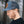 The Sea to Sky flat bill hat worn by a man, showcasing faux leather patch and adjustable snapback design.