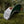 Sea to Sky flat bill hat on green moss with faux leather patch, perfect for outdoor adventures and everyday wear.