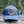 Sea to Sky Trucker Hat with faux leather patch, perfect outdoor hat for women, designed in Canada.