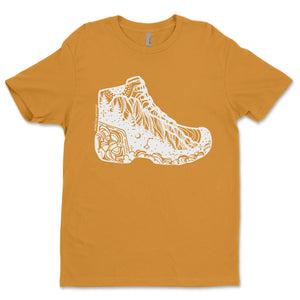 Hiking Boot, Unisex T-shirt, Responsibly Made with outdoor illustrations on a mustard colored shirt.