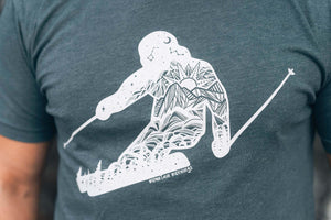 Skier, Unisex T-shirt, Responsibly Made featuring original outdoor illustration by Canadian artist.