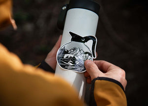 Coffee Pot Sticker applied on a stainless steel tumbler, showcasing a black and white design with mountains.