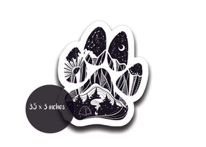 Dog Paw Sticker featuring a black and white original illustration with mountains and trees, made in Canada.