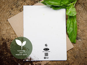 Back side of a plantable seed greeting card with a Mountain Mornings logo, QR code how to plant the card and logo of 1% for the Planet. 