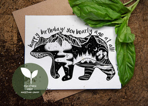 Happy Birthday! You Bearly Age at All!; Plantable Seed Greeting Card with black and white bear illustration and basil leaves.