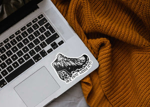 Hike More, Worry Less Sticker on a laptop, showcasing black and white original illustration by a Canadian artist.