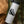 Hike More, Worry Less Sticker on a water bottle, showcasing an original illustration of a hiking boot.
