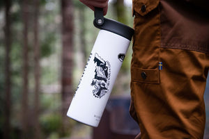 Jasper National Park Sticker on a white insulated bottle in an outdoor setting, showcasing original illustration.