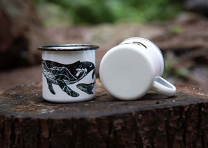 Little Whale Enamel Mug with original illustration of a whale, perfect for outdoor adventures.
