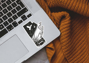 Manitoba Sticker on a laptop, featuring a black and white original illustration, made in Canada.