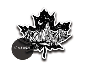 Maple Leaf Sticker Dark featuring a black and white original illustration of mountains and stars, made in Canada.