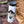 Mountain and Ocean Sticker on a water bottle, showcasing original illustration and outdoor vibes.