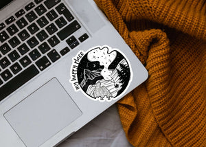 My Happy Place Sticker on a laptop, glossy vinyl outdoor sticker with original illustration by a Canadian artist.