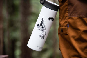 Newfoundland and Labrador Sticker on a white water bottle, showcasing original illustration by a Canadian artist.