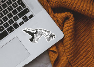 Newfoundland and Labrador Sticker on a laptop, showcasing a black and white original illustration, made in Canada.