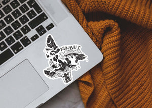 Nunavut Sticker on a laptop, showcasing black and white design by a Canadian artist, perfect for outdoor sticker lovers.