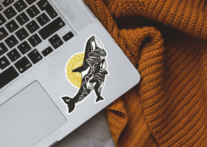 Orca Baby Sticker on laptop, black and white vinyl sticker made in Canada, original illustration, outdoor sticker.
