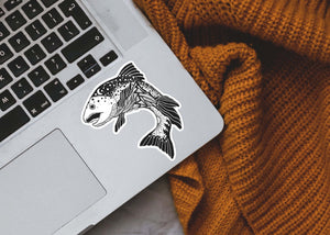 Salmon Sticker on a laptop, showcasing a black and white original illustration. Perfect outdoor sticker from a Canadian artist.