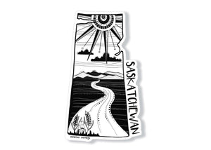 Saskatchewan Sticker featuring a black and white original illustration of the province with a road and sun design.