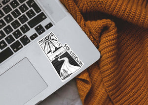 Saskatchewan Sticker on a laptop, featuring an original black and white illustration by a Canadian artist.