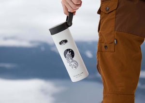 Sea Wolf Sticker on a stylish water bottle held outdoors, featuring original illustration by a Canadian artist.
