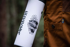 Yoho National Park Sticker on a white tumbler held by a person in brown clothing, showcasing original illustration.